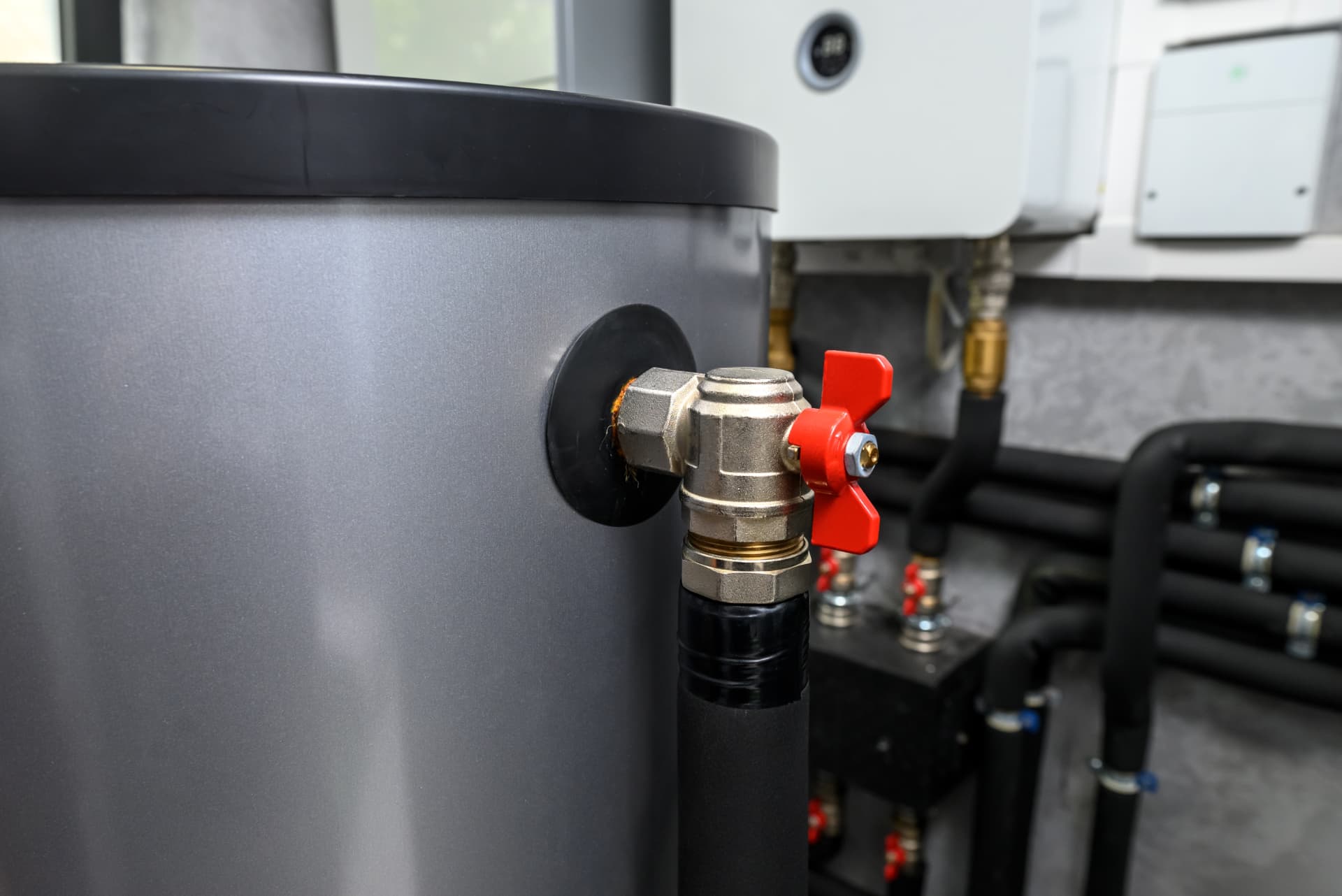 Hot water cylinder with isolation valve and pipework ready for element repair